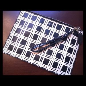 Black/white Coach Bleecker clutch