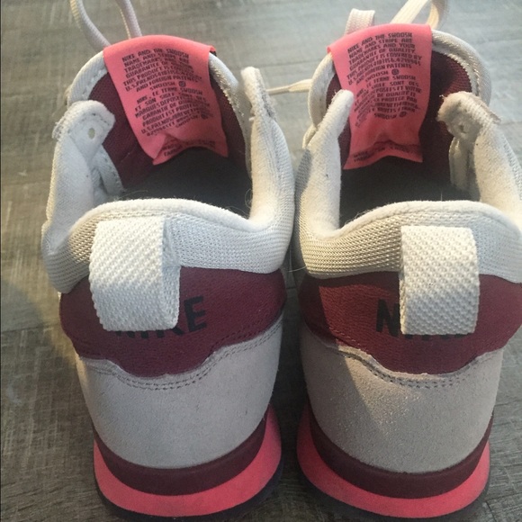 Maroon and salmon colored Nike shoes. Worn twice!