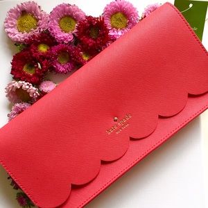 Red scalloped Kate spade wristlet / clutch