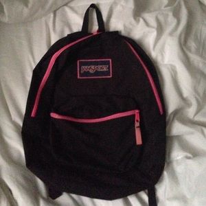 Pink and black Jansport backpack
