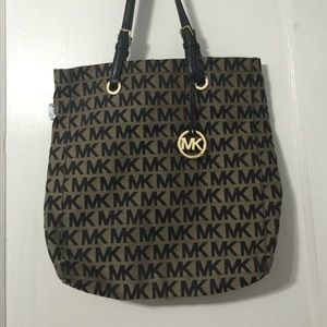Michael Kors tote with black MK logo all around