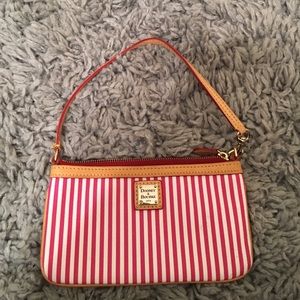 Pink striped dooney and Bourke wristlet