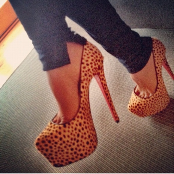 *SOLD* Louboutin jungle print daffodile pumps