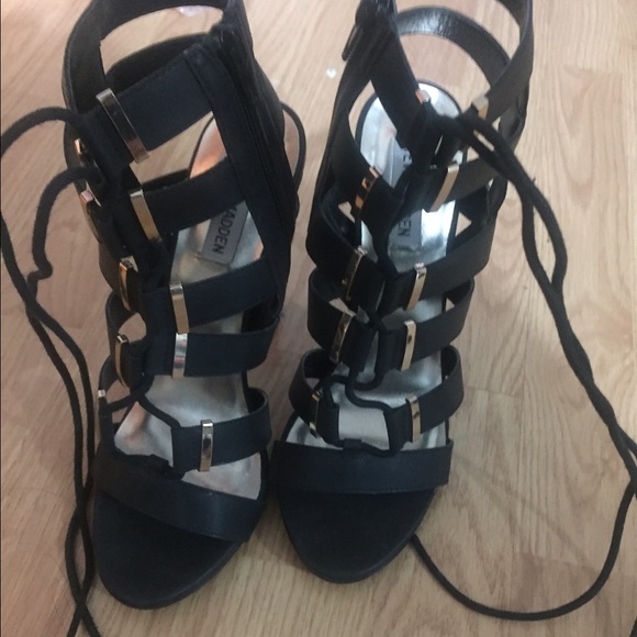 New black with gold detail lace up heels
