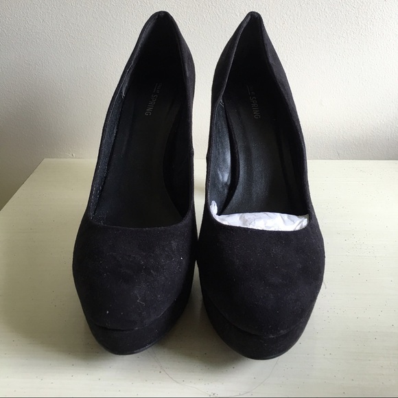 Black suede Call it Spring pumps. US 11