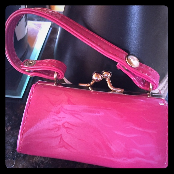 Very cute tiny lip gloss purse