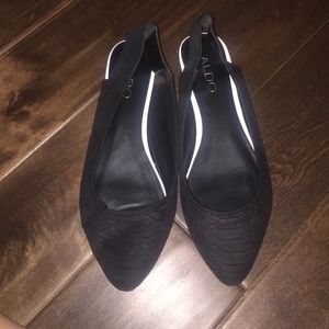 Also black flats with a strap for the ankle