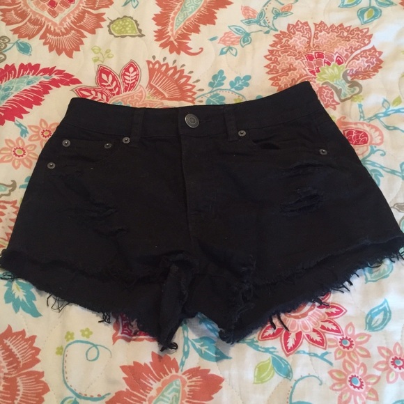 Cut up high waisted black jean shorts