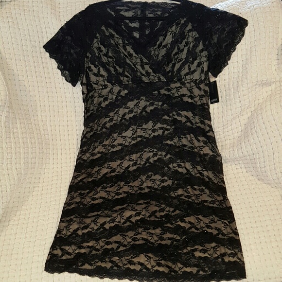 Cascading black overlay dress