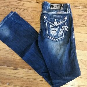 Dark washed Miss Me diamond studded jeans.