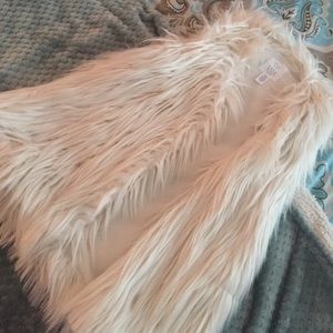Small white fur vest from Tillys