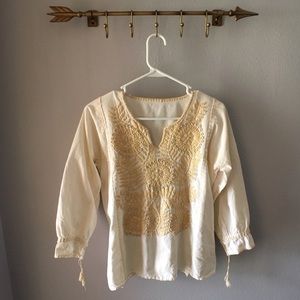 Beautiful hand embroidered cream on white blouse.