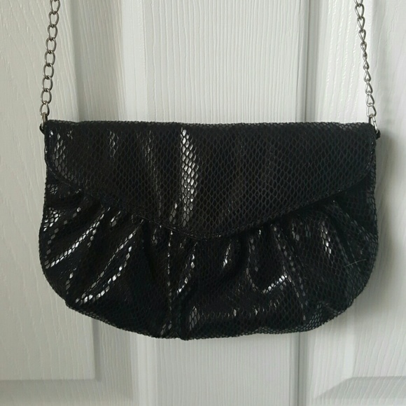 Black handled clutch