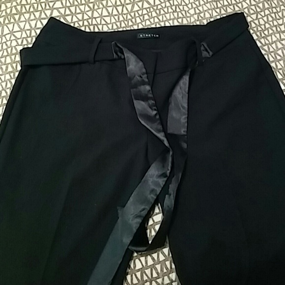 Black pants with silver lining and matching shirt