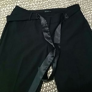 Black pants with silver lining and matching shirt