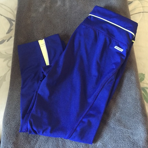 Royal blue leggings with light green trim