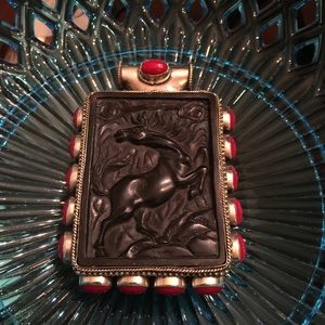 Vintage Natural hand carved bone pendant