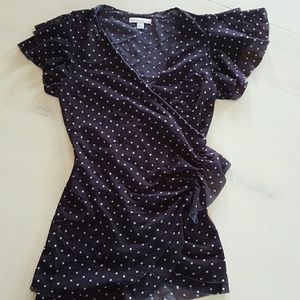 Blue and white polka dot dressy top