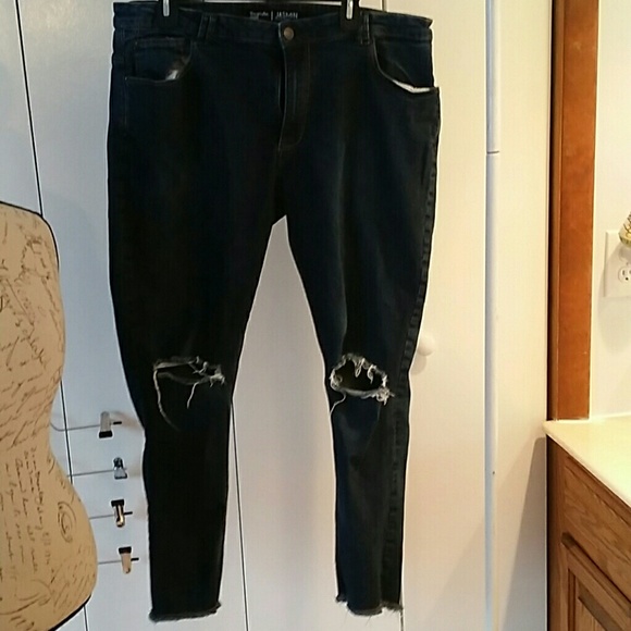 Frayed skinny jeans.