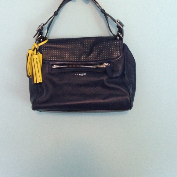 Navy and citrine perforated bag w shoulder strap.