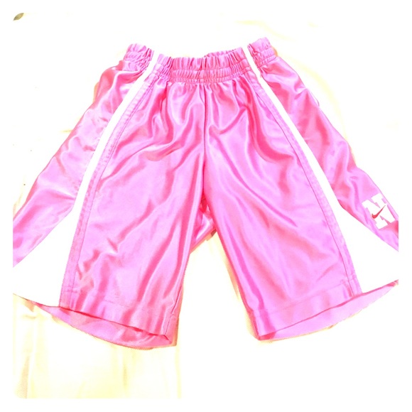 Pink basketball shorts.