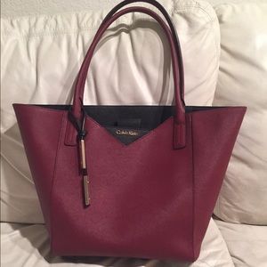 Dark maroon and black Calvin Klein tote