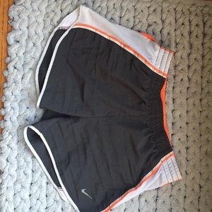 gray/orange Nike shorts