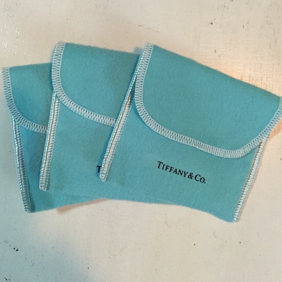 Three Tiffany and Co jewelry dustbags and bags