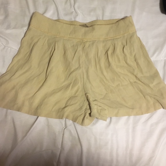 Tan flowy pleated shorts