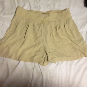 Tan flowy pleated shorts