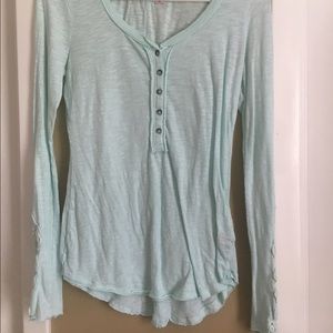 Light aqua long sleeve w/ lace detail on sleeve.