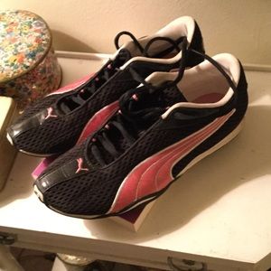 Pink and black Puma Cells running shoes
