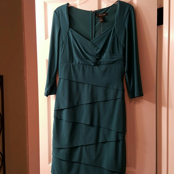 Instantly slimming jade dress