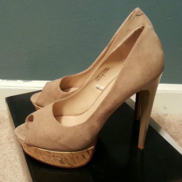 ONE DAY SALE Never worn crazy high heels