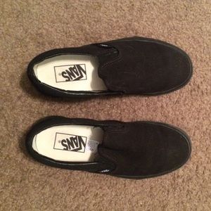 Practically brand new pair of black slip on Vans.