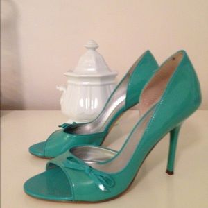 Adorable patent leather d'orsay heels.