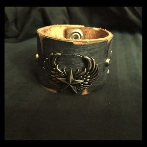 Custom made leather cuff metallic leather and studs