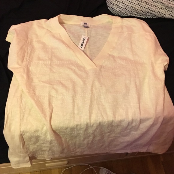 Beautiful white/cream colored short sleeve shirt