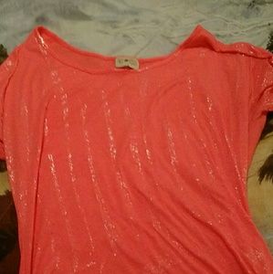 Orange and teal shirts