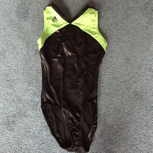 Black and green adidas Leo