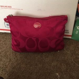 Coach weekender in a pouch