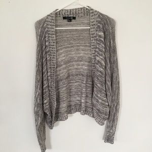 Gray/white cardigan.