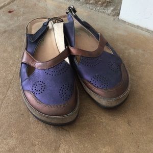 Pair of purple and bronze size 40 Naot shoes.