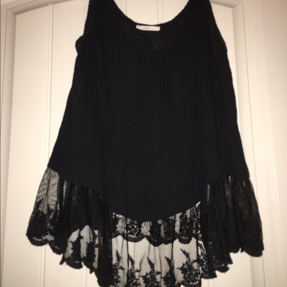 Beautiful black top with detailing at bottom