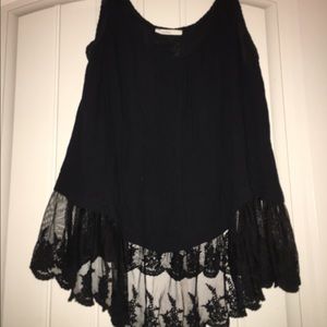 Beautiful black top with detailing at bottom