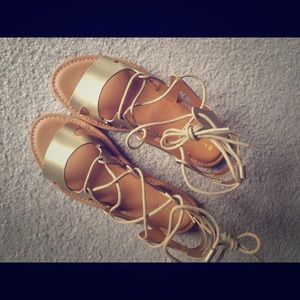 Gold gladiator sandals