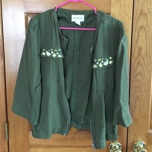 Olive green jacket with rhinestone pocket accent