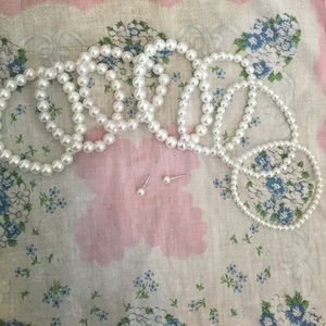 Lot of pearl bracelets and earrings!