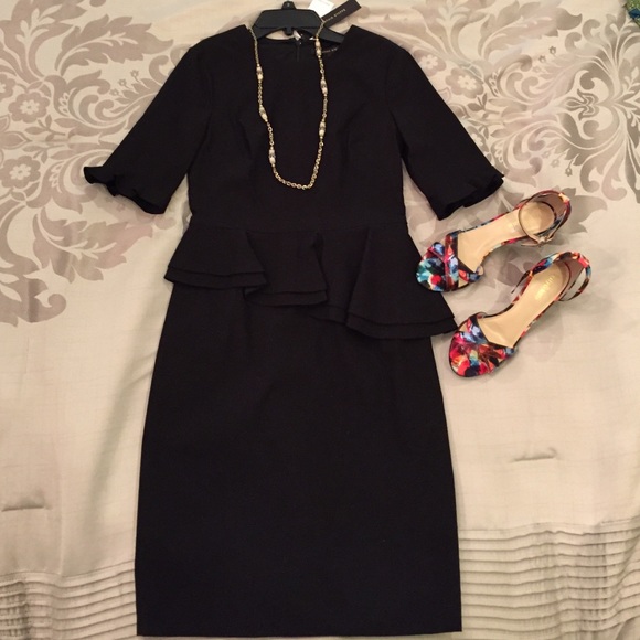 Designer peplum dress by Cynthia Steffe. Size 2
