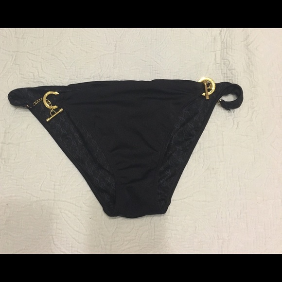 Victoria's Secret swim medium bottom.  Worn once.